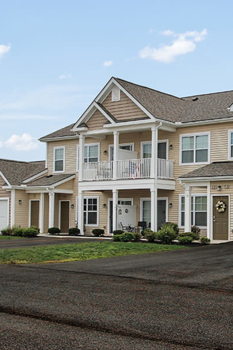 Exterior of Union Square Apartments on a sunny spring day in North Chili, New York