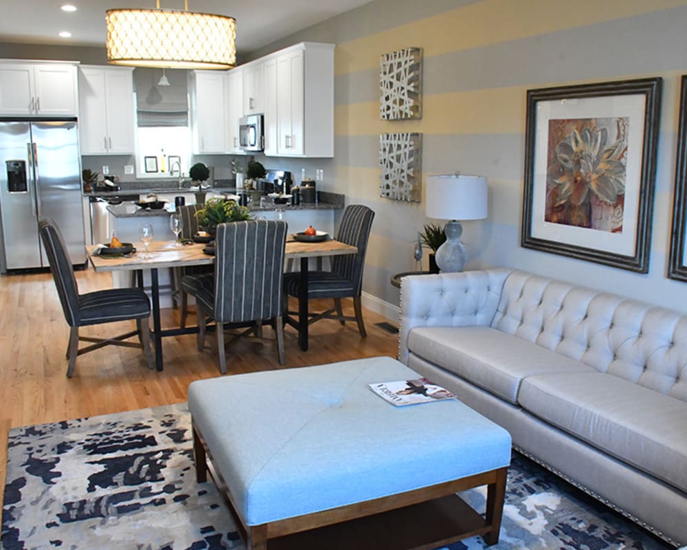 Gorgeous living room and kitchen with dining area at Eden and Main Apartments in Southington, Connecticut