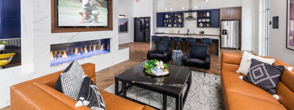 Living room with a view of the water at Radiate in Redmond, Washington