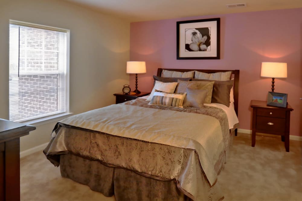 Beautiful bedroom with lots of natural lighting at Denbigh Village in Newport News, Virginia