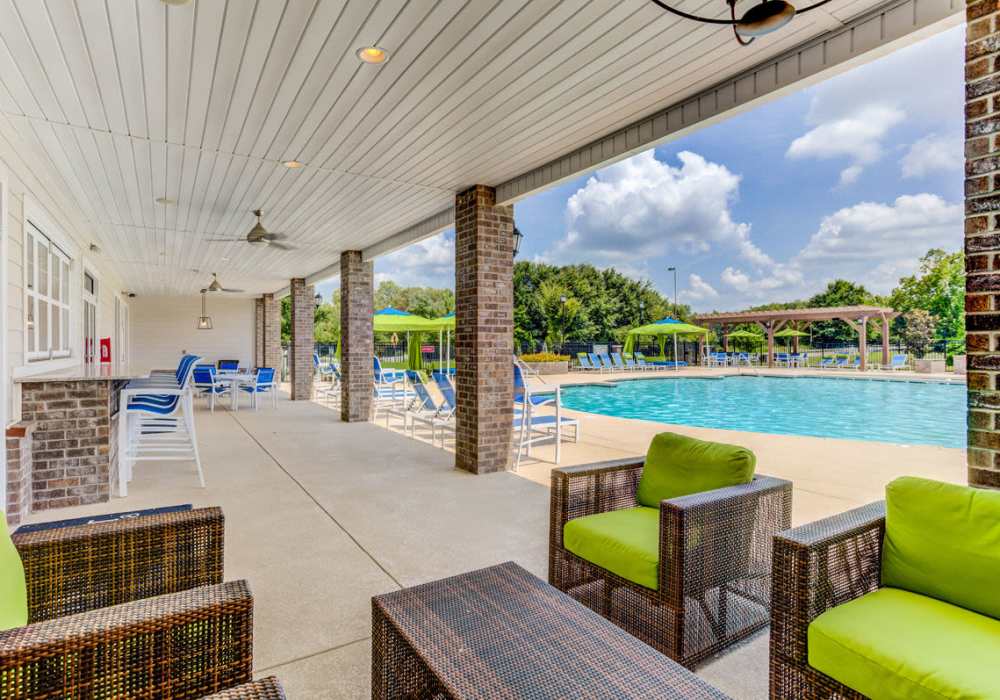 Outdoor seating around pool at Northpoint at 68 in High Point, North Carolina