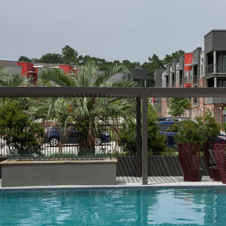 Shaded pavilion with lounge seating at Anatole at the Pines in Conroe, Texas