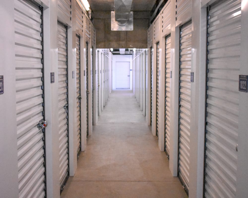 White doors on interior climate-controlled storage units at STOR-N-LOCK Self Storage in Henderson, Colorado