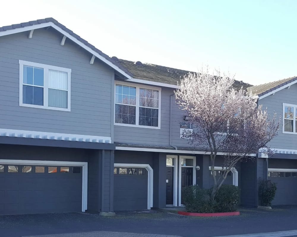 Exterior view with garage parking at Seville at Mace Ranch in Davis, California