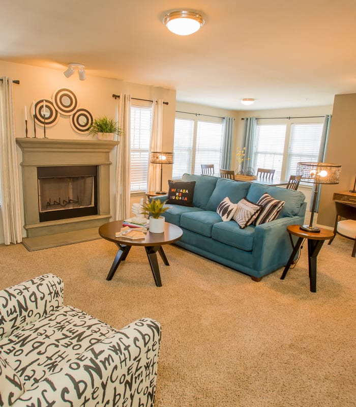 Spacious living room with large windows at Tuscany Ranch in Waco, Texas