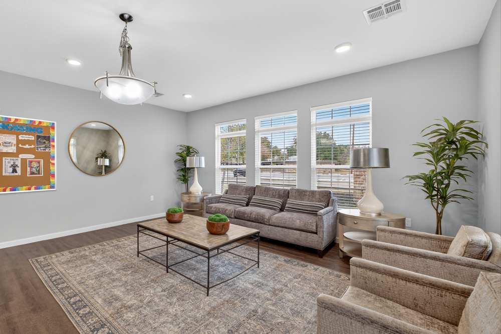Bright and inviting living space with modern touches and abundant natural light at Lakewood Crossing in Granbury, Texas.
