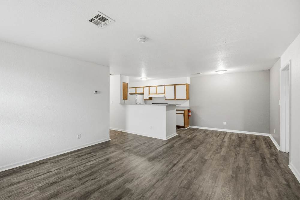 A view of the kitchen with access to dinning and living area at Parkford Apartments in Iola, Kansas.