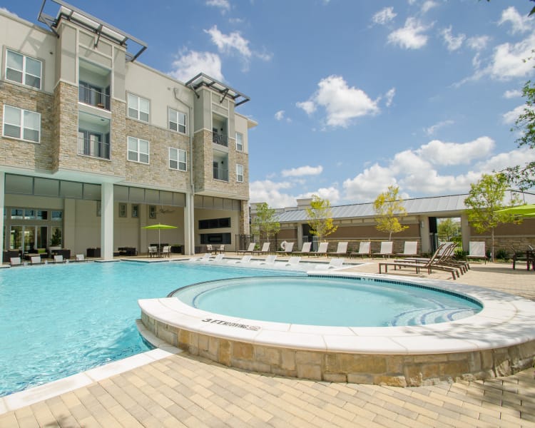 Beautiful swimming pool area at GreenVue Apartments