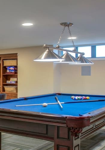 Game room with pool table at Chilton Towers in Elizabeth, New Jersey