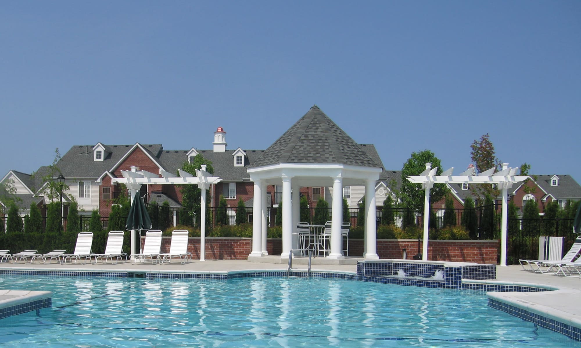Refreshing swimming pool at apartments offered by Singh Development Company