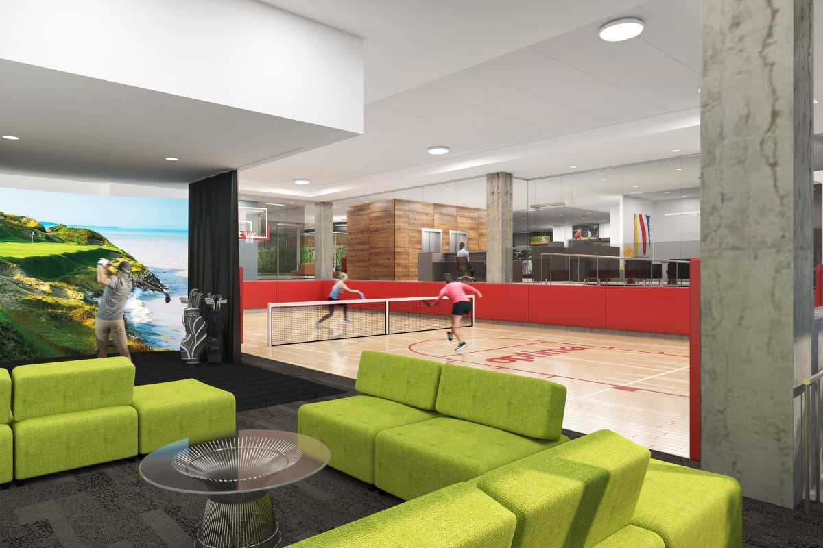Elegant green couches in lobby area at Optima Verdana™ in Wilmette, Illinois