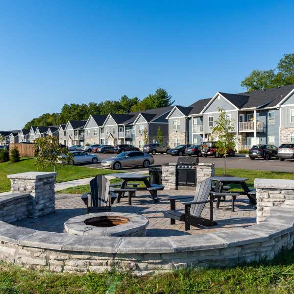 Exterior view of apatment with parked vehicle at Alexander Pointe Apartments in Maineville, Ohio