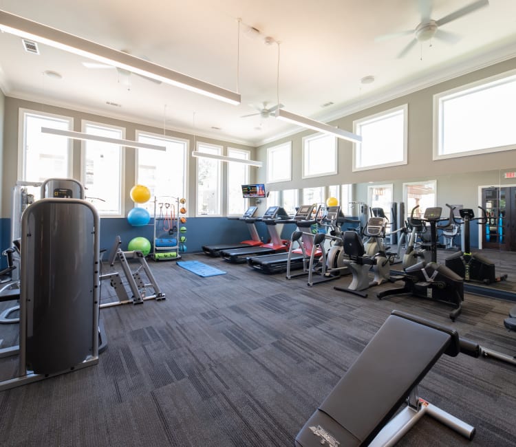Well equipped fitness center at Hilltops in Conroe, Texas
