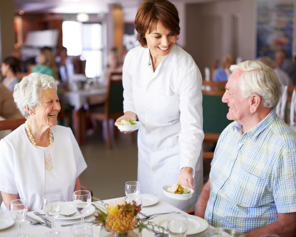 Residents of The Harmony Collection at Columbia Assisted Living & Memory Care happy about their food in Columbia, South Carolina