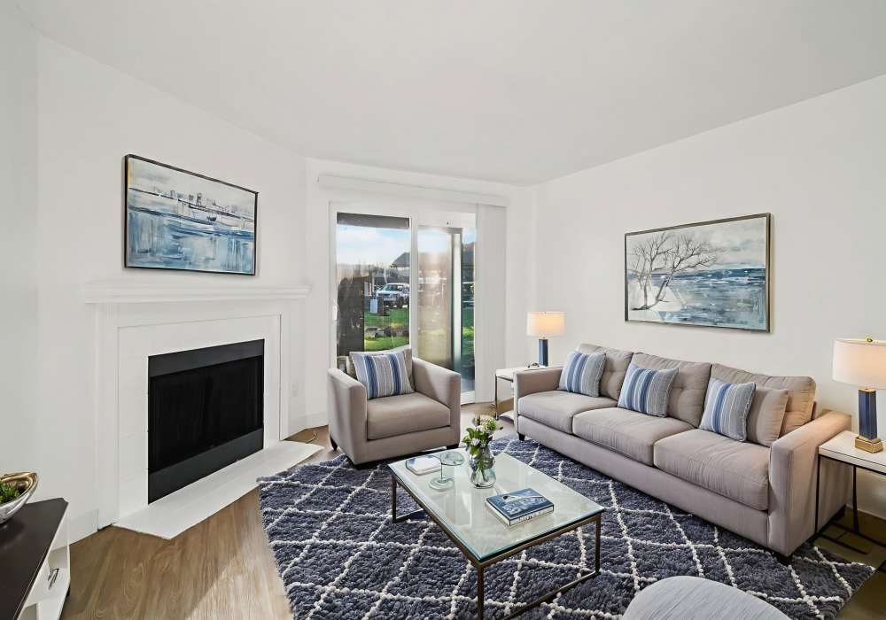Living room with an elegant neutral color palette at Foundry on Fifth in Renton, Washington