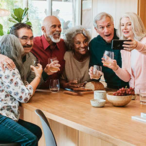 Residents taking a group selfie at Schuyler Commons in Utica, New York