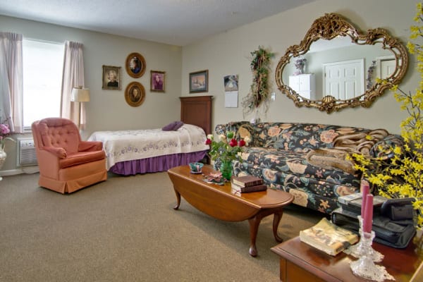 Assisted living apartment bedroom at Willow Brooke in Union, Missouri