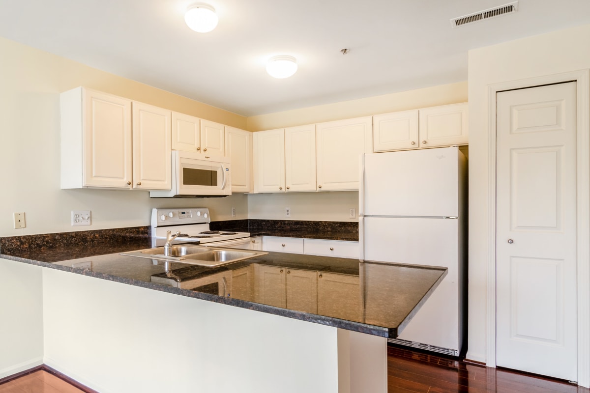 A modern unit kitchen at Central Park Estates in Novi, Michigan