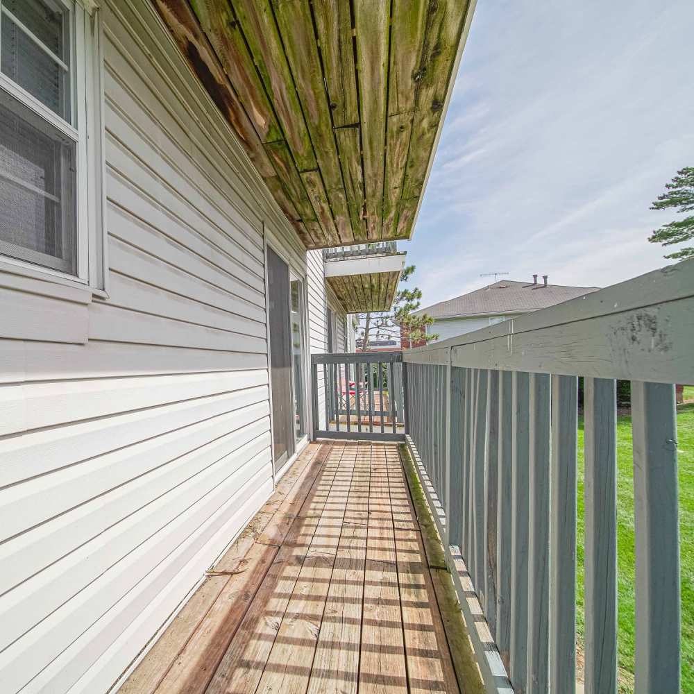 Private balcony at Village Green Apartments in Chesterfield, Missouri