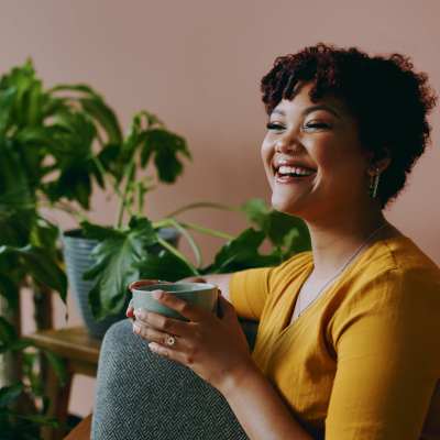 Resident enjoying a cup of coffee at City Limits Apartments in Columbia, Tennessee