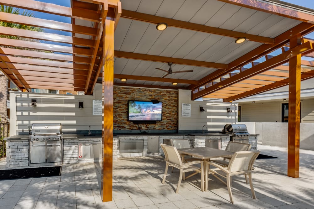 Shaded pavilion with an outdoor kitchen at The Point at Town Center in Jacksonville, Florida