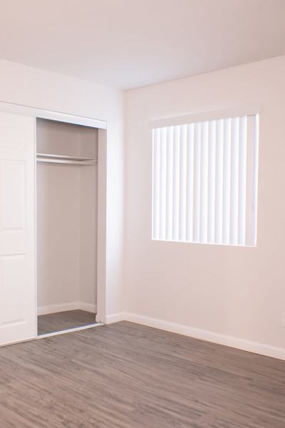 Unfurnished bedroom with closet at Sand Pebble and Spanish Oaks in Sparks, Nevada