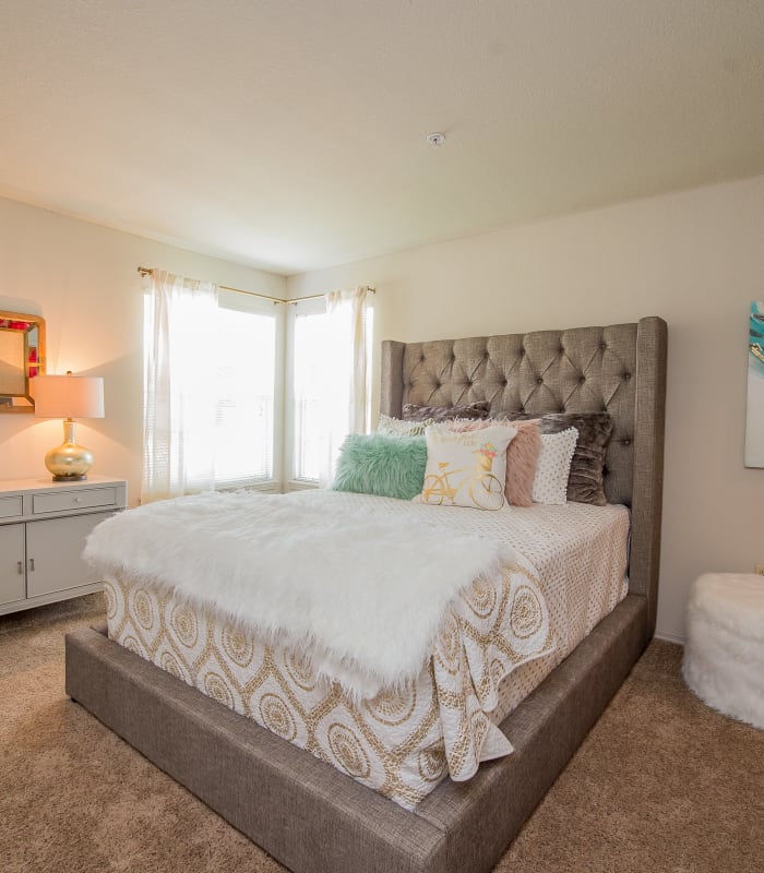 Chic bedroom at Crown Chase Apartments in Wichita, Kansas