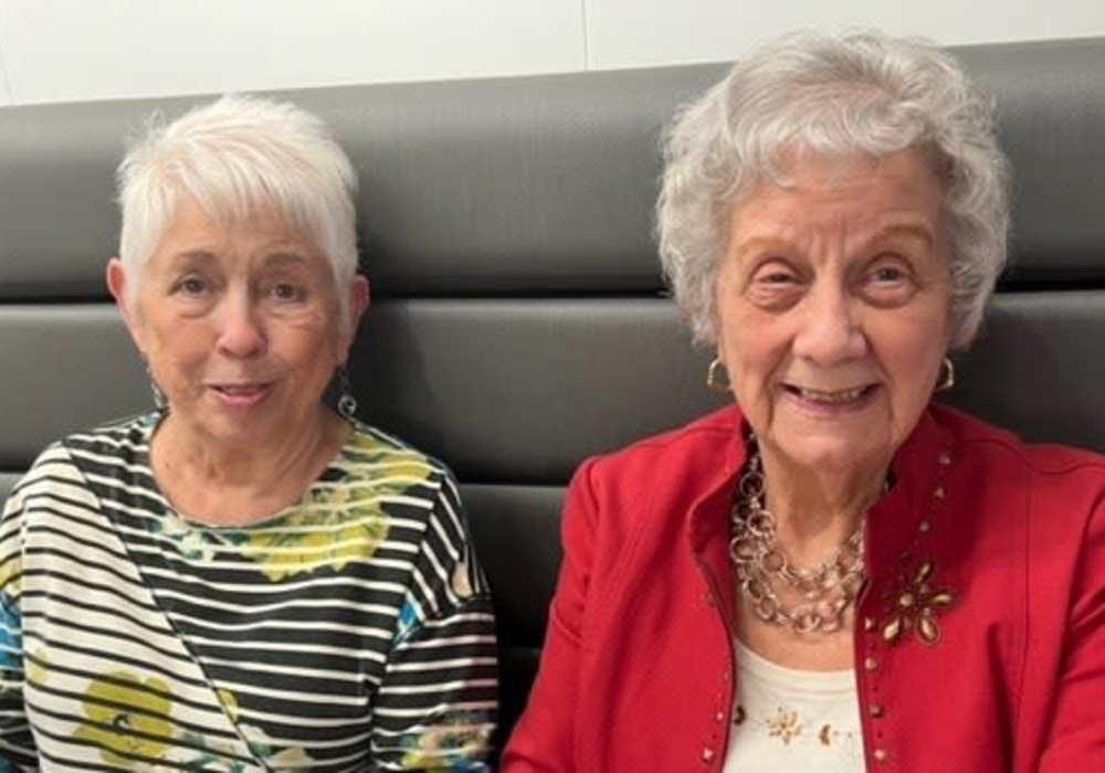 Resident friends sitting in a booth at Turners Rock in Springfield, Missouri