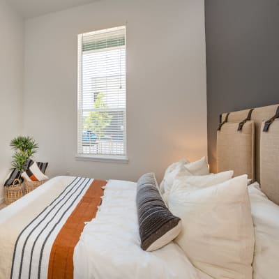 Brightly lit bedroom at West 38 in Wheat Ridge, Colorado