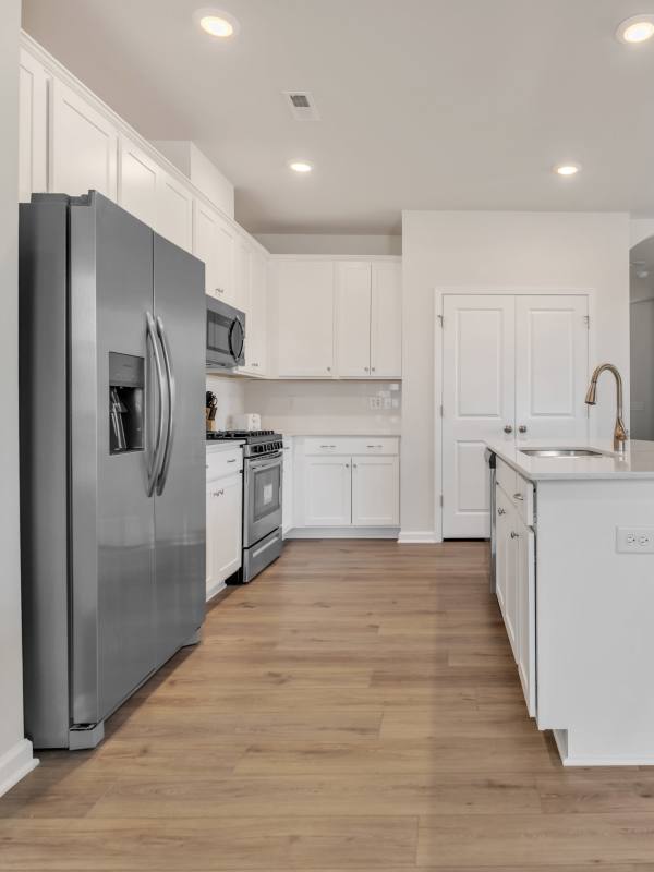 Kitchen with stainless-steel appliances at Eagle Chase in Taylors, South Carolina