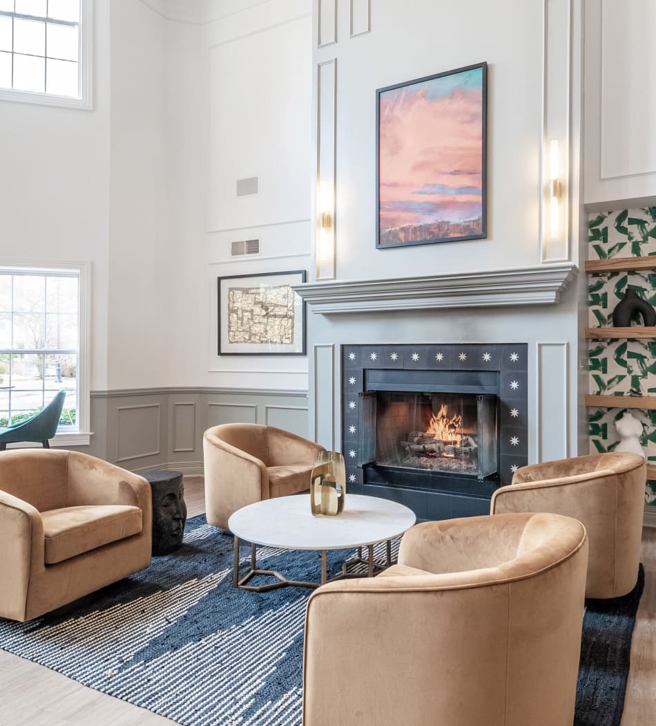 Beautiful coze clubhouse with fireplace at Sofi at Salem Station in Salem, Massachusetts