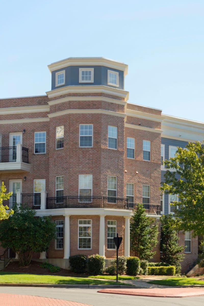 Exterior of Worthington Apartments & Townhomes on a sunny spring day in Charlotte, North Carolina