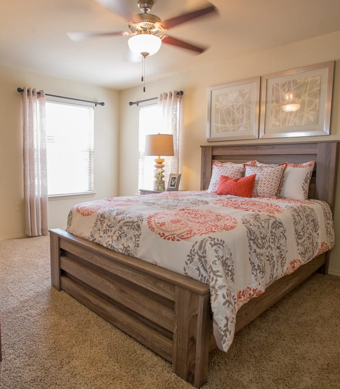 Spacious carpeted bedroom at Mission Point Apartments in Moore, Oklahoma