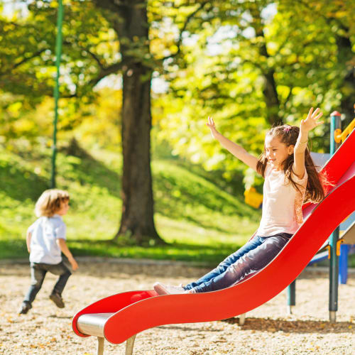 Children playing at a playground at Midway Manor in Virginia Beach, Virginia