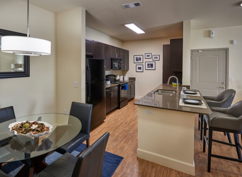 A kitchen and dining room at M2 Apartments in Denver, Colorado