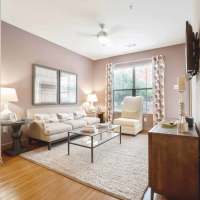 Living room with white colored sofa at Grapevine Station in Grapevine, Texas