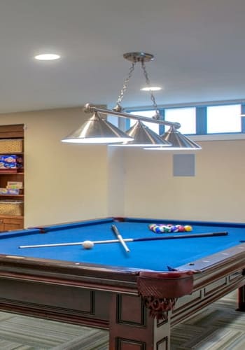 Game room with pool table at Chilton Towers in Elizabeth, New Jersey