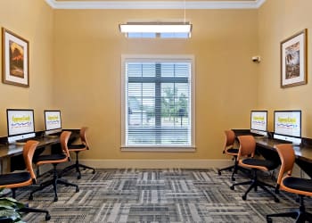 Business center with iMacs at Cypress Creek Parker Boulevard in Royse City, Texas