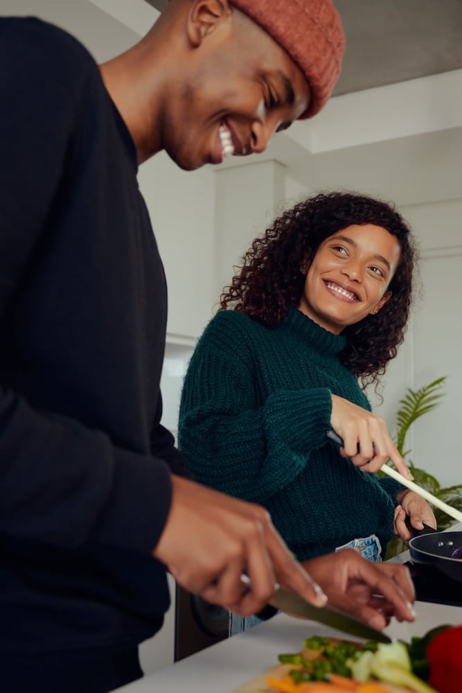 Residents cooking in their kitchen at Lakewood Park Apartments in Lexington, Kentucky