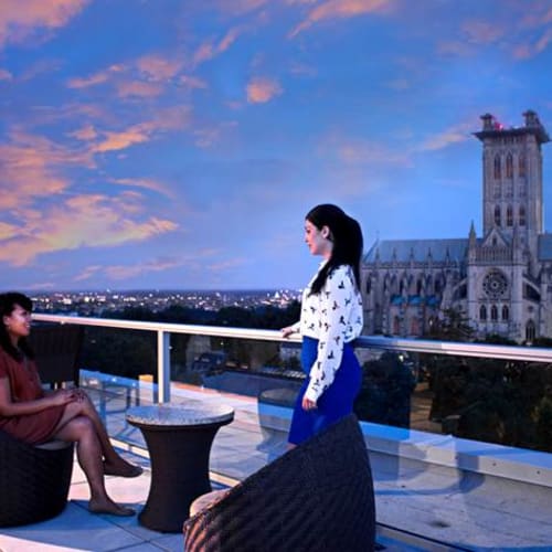 Residents on the rooftop enjoying a view at Adams View in Washington, District of Columbia