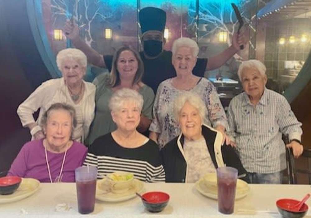 Residents having a meal at a restaurant near Truewood by Merrill, Keller in Keller, Texas