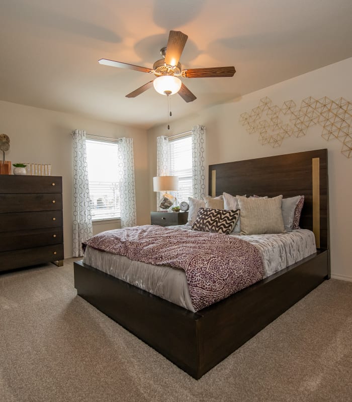 Spacious carpeted bedroom at Cottages at Crestview in Wichita, Kansas