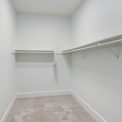 A walk-in closet in a home at Aero Ridge in San Diego, California