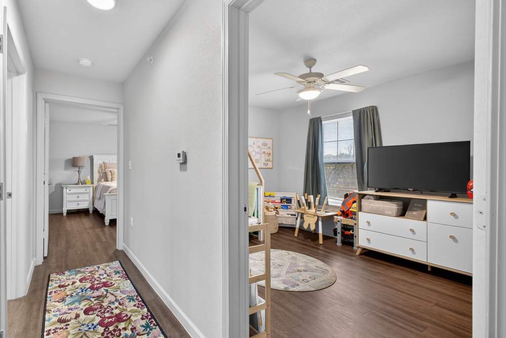 Charming bedroom at Lakewood Crossing in Granbury, Texas.