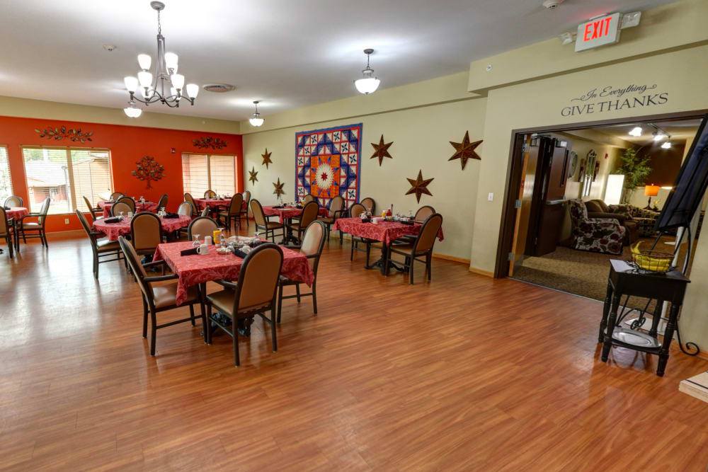 Spacious and brightly lit dining room at Garnett Place in Cedar Rapids, Iowa.