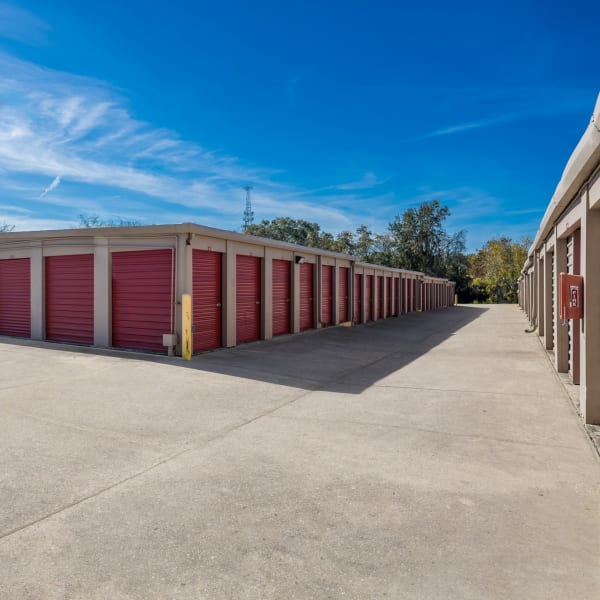 Drive-up storage units with wide drive aisles at StorQuest Self Storage in Gainesville, Florida