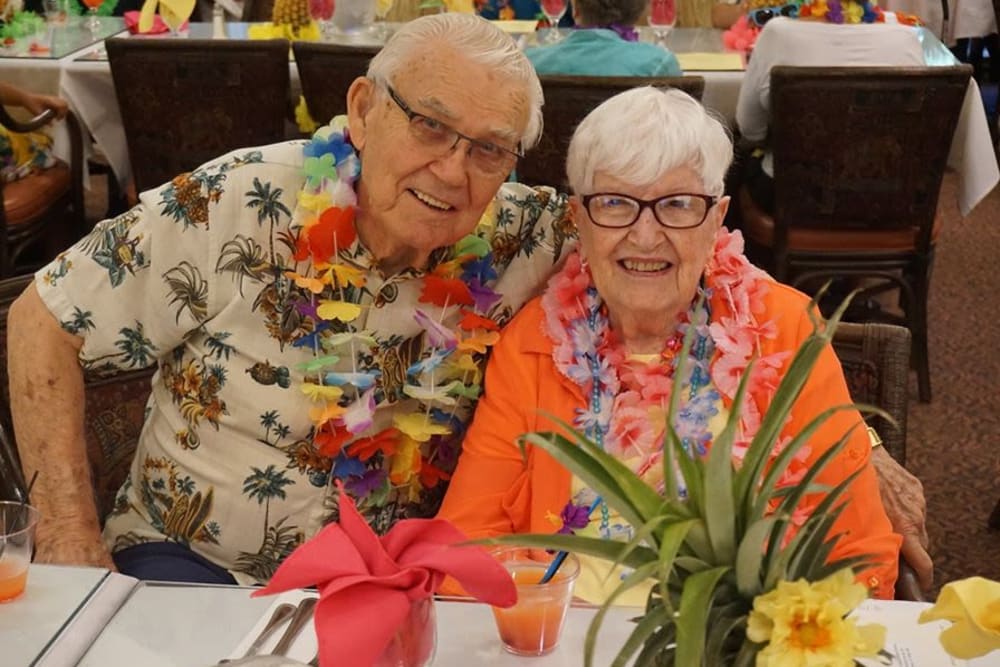 Resident enjoying a Luau party at Winding Commons Senior Living in Carmichael, California