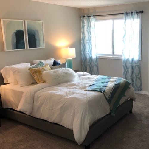 Cozy apartment bedroom at Bristol Village in Bloomington, Minnesota