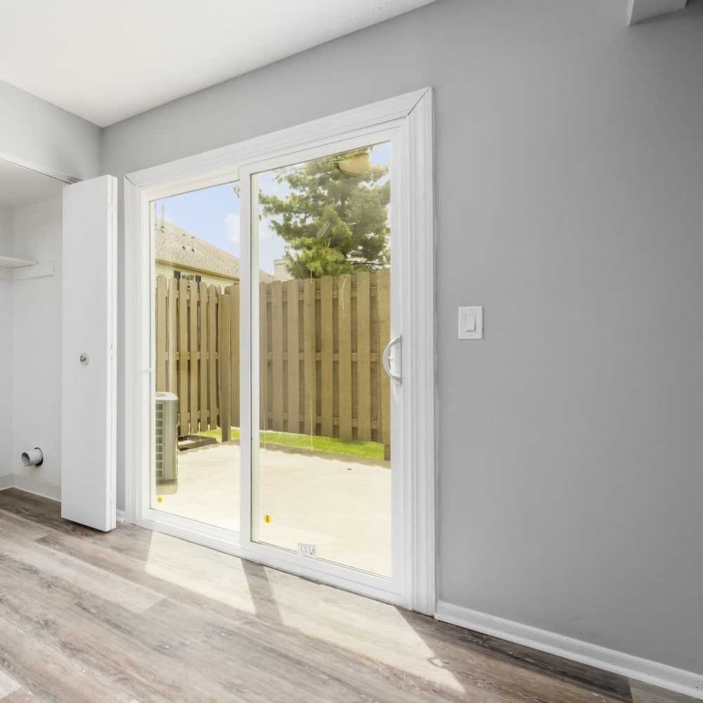 Large sliding glass doors out to patio at Hidden Acres East in Columbus, Ohio