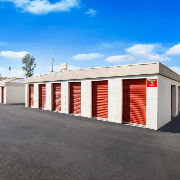 Outdoor storage units with drive-up access at StorQuest Self Storage in Loma Linda, California